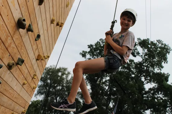 Girl Rock Climbing